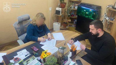 голова райслужби у справах дітей в Києві підозра