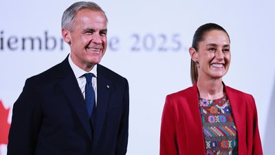 Марк Карні та Клаудія Шейнбаум 
