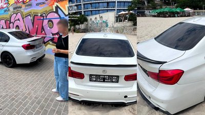 BMW без номерних знаків, що застрягла на пляжі Одеси