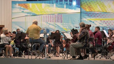 Симфонічний оркестр на репетиції Симфонічний оркестр на репетиції