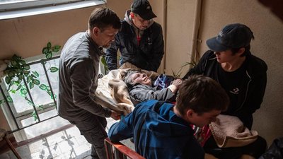 З-під обстрілів на Салтівці евакуювали жінку з інвалідністю