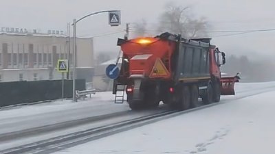 Сніг у Хмельницькому й корки на дорогах — фоторепортаж